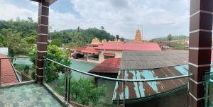 a view of a temple from the balcony of a building at Hotel Rasa Sayang Artisan Inn Jelebu in Kampong Seperi