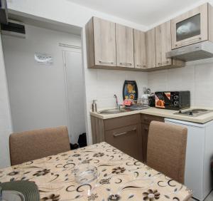 Virtuvė arba virtuvėlė apgyvendinimo įstaigoje 7 Days Premium Apartment