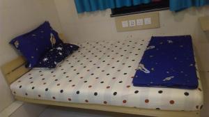 Un pat sau paturi într-o cameră la New hoover hostel