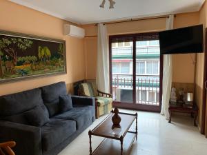 A seating area at Apartamentos Torr en Madrid - Chamartín