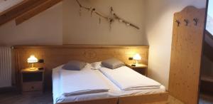 Katil atau katil-katil dalam bilik di Albergo Bernard
