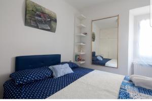 Posteľ alebo postele v izbe v ubytovaní ControVento Apartament II