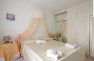 Posteľ alebo postele v izbe v ubytovaní ControVento Apartament II