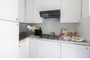 Kuchyňa alebo kuchynka v ubytovaní ControVento Apartament II
