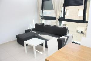 Posezení v ubytování Apartamento Plaza Felipe V Inmomart