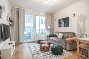 TV a/nebo společenská místnost v ubytování Apartment with Balcony
