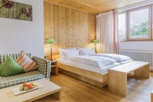 Postel nebo postele na pokoji v ubytování Schlegelhof