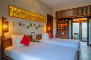 Voodi või voodid majutusasutuse Hoi An Chic - Green Retreat toas