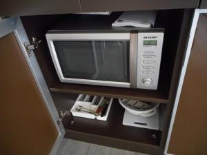 Kuchyň nebo kuchyňský kout v ubytování Residence San Marino