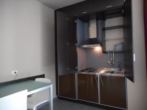 Kuchyň nebo kuchyňský kout v ubytování Residence San Marino