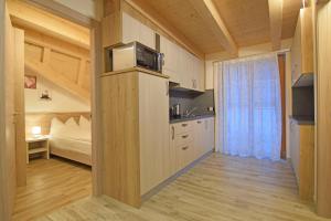 Kuchyň nebo kuchyňský kout v ubytování casa vacanze arcobaleno
