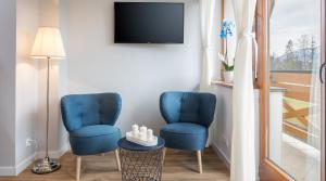 Posezení v ubytování TWOJA CHATA Apartamenty pod niebem zarezerwuj na podhalami pl