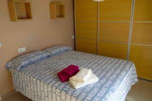 Postel nebo postele na pokoji v ubytování Ático Calpe primera línea de playa