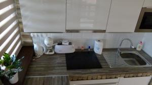 A kitchen or kitchenette at Duna Dráva Vendégház
