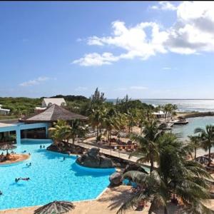 Πισίνα στο ή κοντά στο Studio vue mer piscine plage Kaz Punch Manganao chez Julie