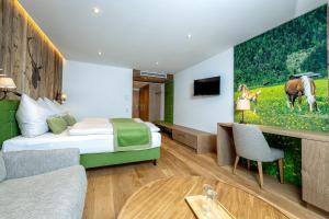 TV a/nebo společenská místnost v ubytování Hotel Schörhof