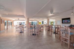 Restoran või mõni muu söögikoht majutusasutuses Time Out Hotel