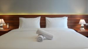 Letto o letti in una camera di Mantra Gili