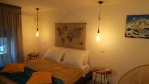 Säng eller sängar i ett rum på Duba House Holiday Home