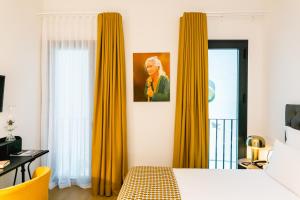 Postel nebo postele na pokoji v ubytování Joya del Casco Boutique Hotel by Shiadu