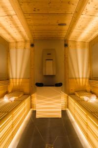 a wooden room with two beds in it at Royal Palm Resort & Spa - Adults Only in Playa Jandia