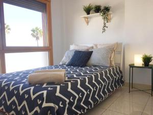 Postel nebo postele na pokoji v ubytování La Cornisa Villa by WaveProperties
