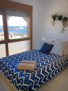 Postel nebo postele na pokoji v ubytování La Cornisa Villa by WaveProperties