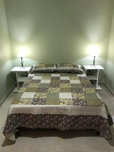A bed or beds in a room at Camino a Termas