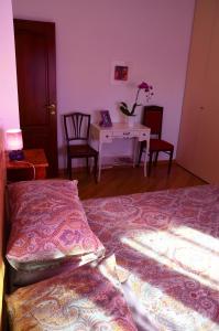 Postel nebo postele na pokoji v ubytování B&B SPLENDIDAE MUNDI