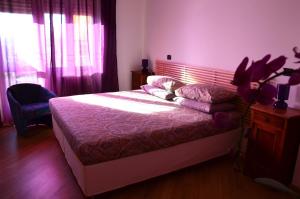 Postel nebo postele na pokoji v ubytování B&B SPLENDIDAE MUNDI