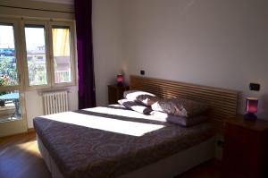 Postel nebo postele na pokoji v ubytování B&B SPLENDIDAE MUNDI