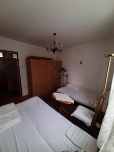 Voodi või voodid majutusasutuse Mimy Rooms toas