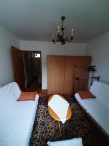 Voodi või voodid majutusasutuse Mimy Rooms toas