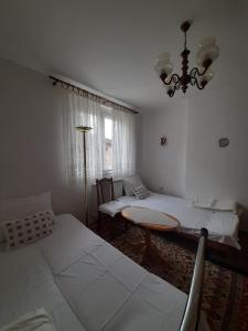 Postel nebo postele na pokoji v ubytování Mimy Rooms