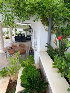 Zahrada ubytování Maison Alriad - Alojamiento familiar tranquilo cerca del mar con jardín, porche y parking privado en el interior de la finca no apto para fiestas
