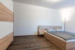 Posteľ alebo postele v izbe v ubytovaní Mami Style Apartments