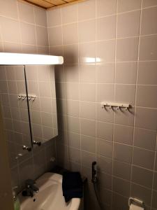 Ένα μπάνιο στο Aaria Apartment