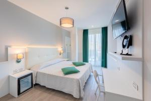 Postel nebo postele na pokoji v ubytování Hotel Austria
