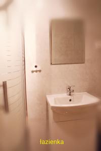 Kúpeľňa v ubytovaní Pati Apartament Słonko