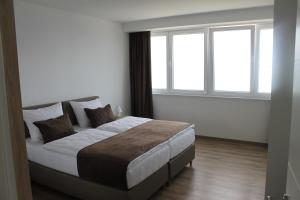 Posteľ alebo postele v izbe v ubytovaní Villa Isabela