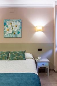 Voodi või voodid majutusasutuse Hotel Sulayr toas