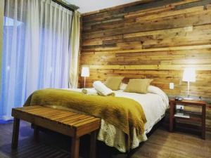 Postel nebo postele na pokoji v ubytování Hotel 381 Panguipulli