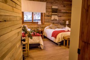 Postel nebo postele na pokoji v ubytování Hotel 381 Panguipulli