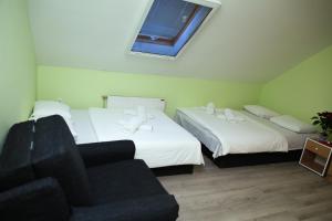 Letto o letti in una camera di Zmajevac Fruska Gora