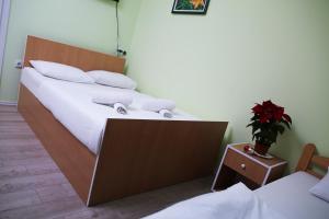 Letto o letti in una camera di Zmajevac Fruska Gora