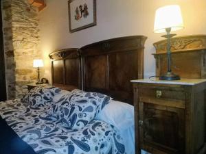 Cama o camas de una habitación en La Forqueta y El Fontanal