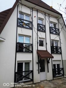 Budova, kde se apartmán nachází + 9 fotografií