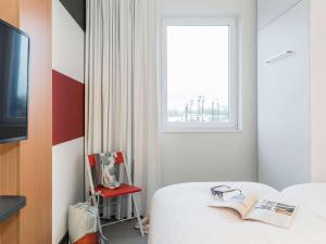 Postel nebo postele na pokoji v ubytování ibis budget Brugge Jabbeke + 37 fotografií