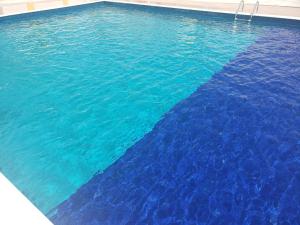 A piscina localizada em Suítes Soure ou nos arredores