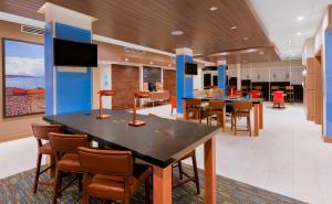 a large dining room with a large table and chairs at Holiday Inn Express & Suites - Prosser - Yakima Valley Wine, an IHG Hotel in Prosser